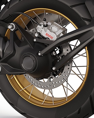 The golden cross-spoked wheels of the R 1300 GS Option 719 Biscaya